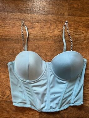 light blue corseted top with chain straps